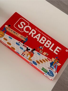 Hasbro SCRABBLE Game - Red Box with Illustrated Board Art